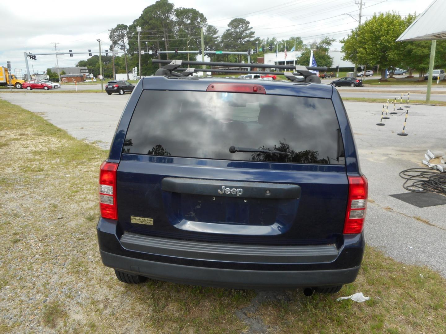 2014 Blue Jeep Patriot Sport 2WD (1C4NJPBA5ED) with an 2.0L L4 DOHC 16V engine, located at 2553 Airline Blvd, Portsmouth, VA, 23701, (757) 488-8331, 36.813889, -76.357597 - ***VEHICLE TERMS*** Down Payment: $999 Weekly Payment: $90 APR: 23.9% Repayment Terms: 42 Months *** CALL ELIZABETH SMITH - DIRECTOR OF MARKETING @ 757-488-8331 TO SCHEDULE YOUR APPOINTMENT TODAY AND GET PRE-APPROVED RIGHT OVER THE PHONE*** - Photo#6